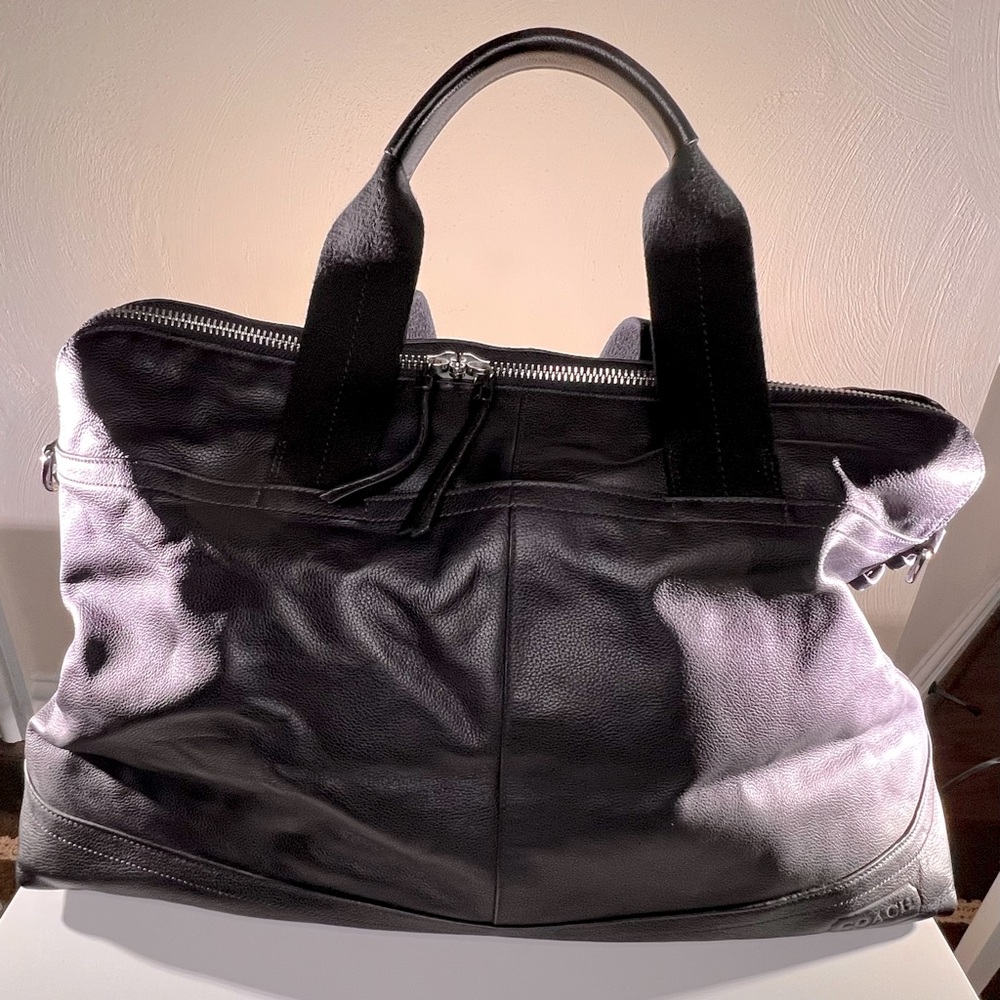 Leather Coach duffel/cabin bag in black leather with shoulder strap